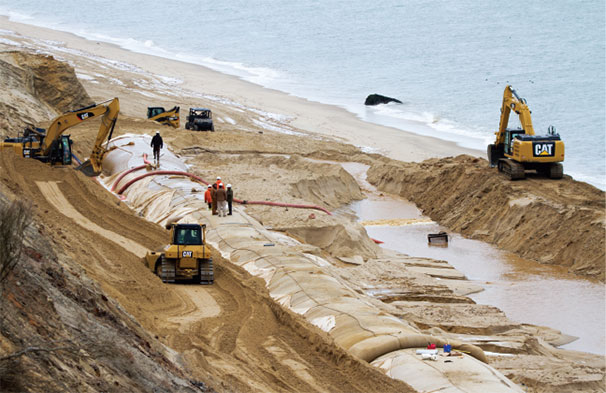 In January 2014 these fabric geotubes were installed along the toe of the Sconset Bluff to protect it from the pounding waves.